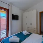 Semesterbostad Porto Pino, Garden And Pool Southsardiniaholidays